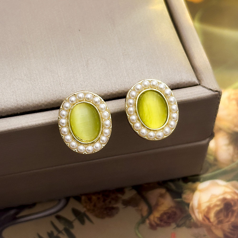 37 # ojos de gato con perlas verdes