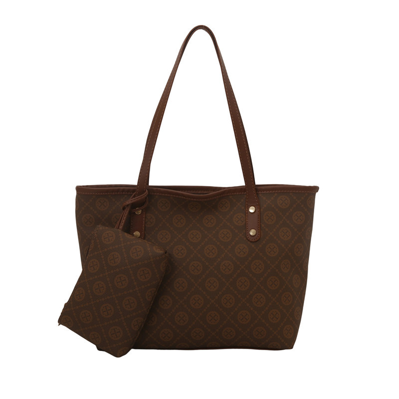 Nicho de diseño de alta sensación 2025 nueva moda versátil gran capacidad de hombro portátil bolso de mano de mujer