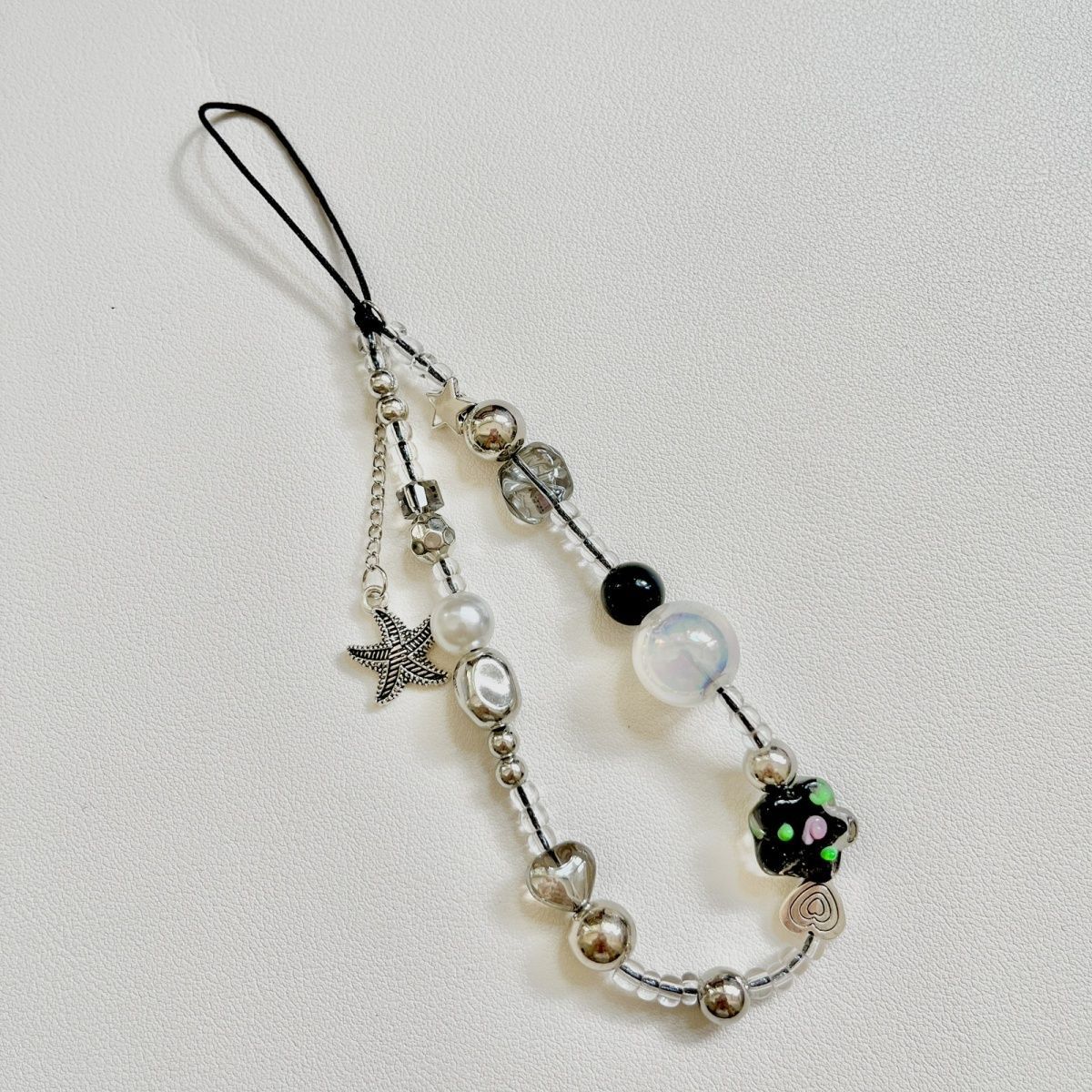 Coreano ins flores dulces y frías pulseras irregulares DIY para todos los casos de teléfonos móviles colgante de corazón de niña colgante