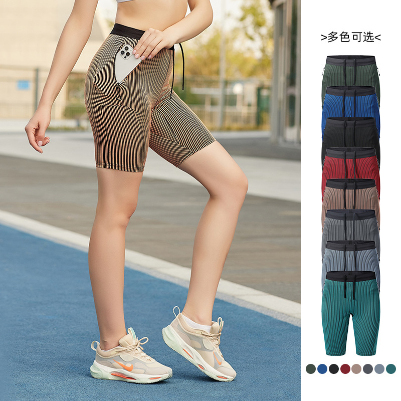 Pantalones de yoga para correr y hacer ejercicio en atletismo en verano con pantalones cortos ajustados y pantalones de cinco puntos con alta elasticidad y compresión para levantar las caderas.