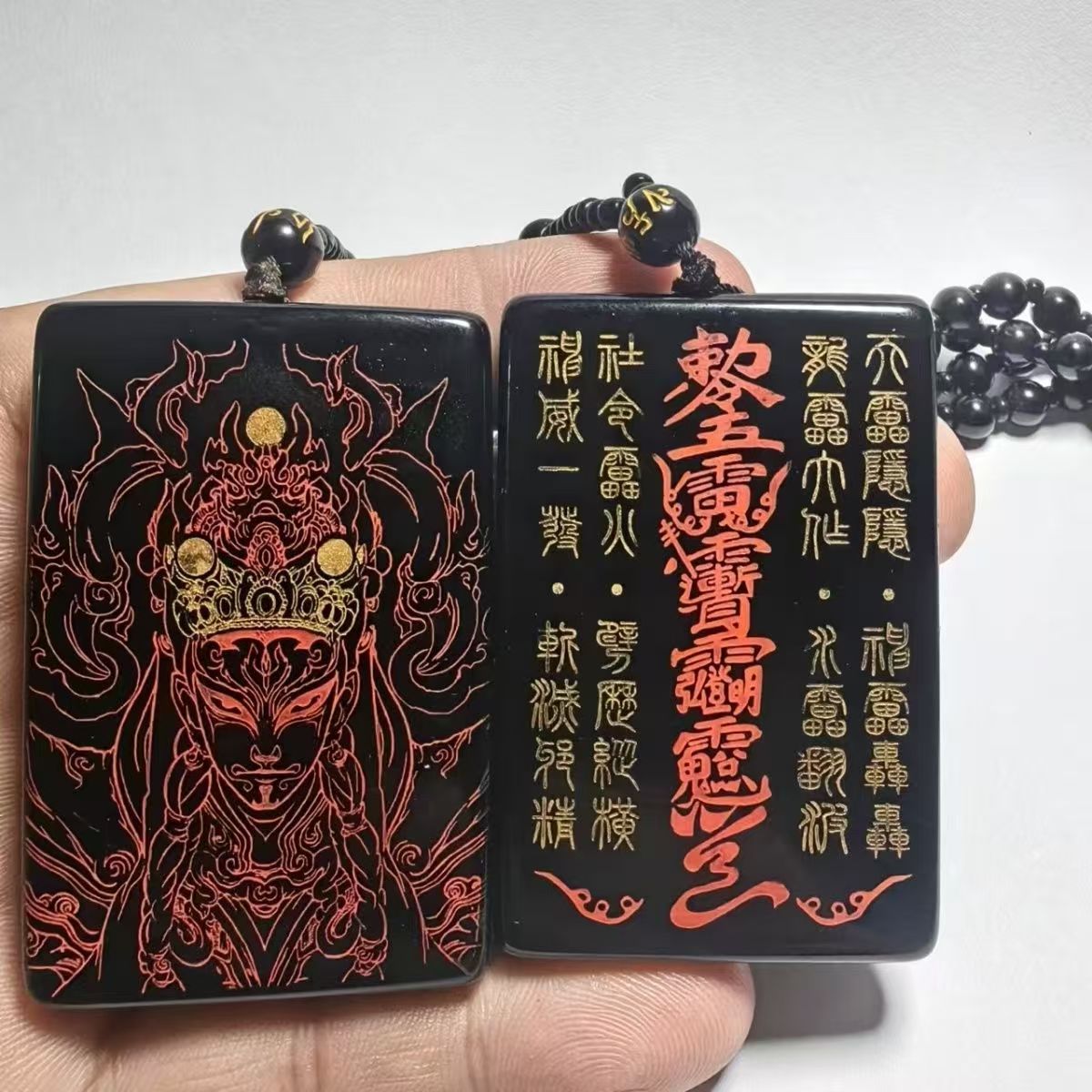 Carved protective amulet