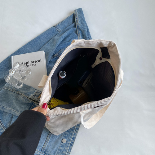 Wholesale new fashion large-capacity canvas bag Korean version student class versatile simple shoulder bag Japanese women's bag