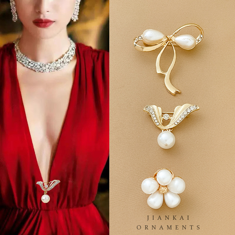 Arco de mariposa artefacto de alta gama sin costura broche pequeño temperamento femenino universal pin de ropa fija de traje collar