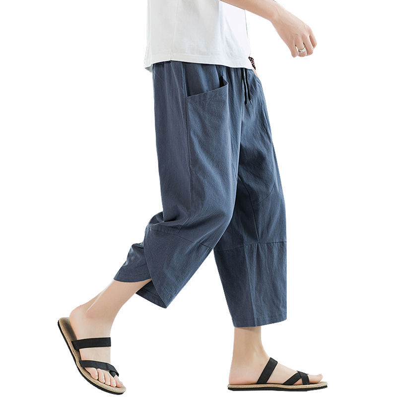 Pantalones cortos de verano, pantalones casuales de lino fino para hombres, pantalones harem sueltos de gran tamaño de estilo chino, pantalones cortos de playa de algodón y lino, marea