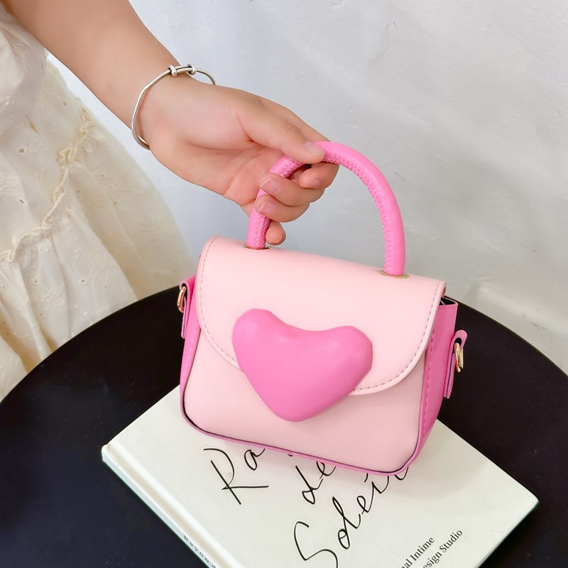 Bolsos para chicas coreanas de dibujos animados de amor contra colores de moda extranjera para niños de un solo hombro bolso de cambio