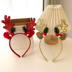 国境を越えたクリスマスのカチューシャ鹿の角の鈴のフラッシュのピンクの頭は大人の子供のパーティーの装飾用品の髪飾りのクリスマスの服を掛けます。