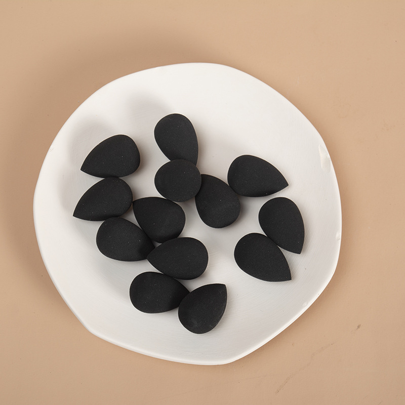 Mini huevo de maquillaje mini huevo de maquillaje esponja bola esponja pequeña gota de agua base líquida