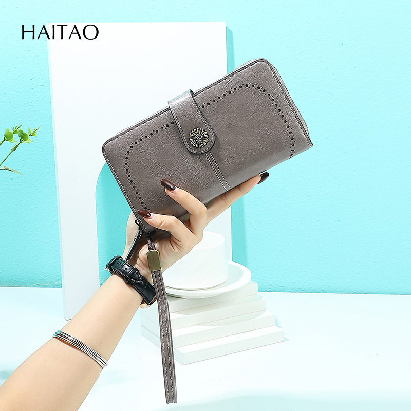 2025 nueva moda retro simple billetera larga de cuero graso para mujer bolso de mano multifuncional de gran capacidad