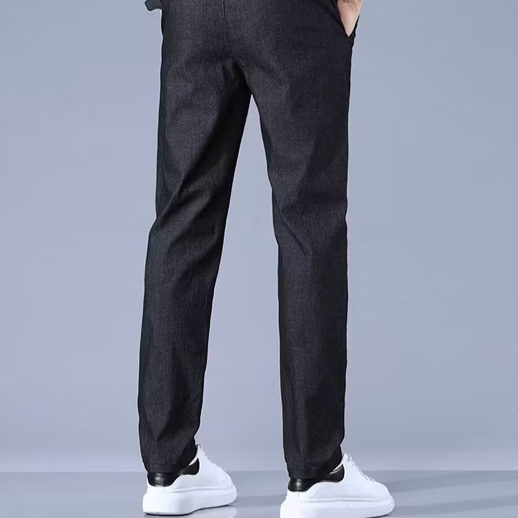 2024 modelos de primavera y otoño nueva moda de mezclilla de imitación de todo fósforo pantalones rectos delgados pantalones casuales sueltos de todo fósforo hombres de moda