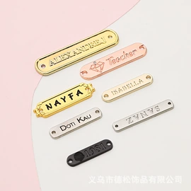 铭牌;标签、标牌;钮扣