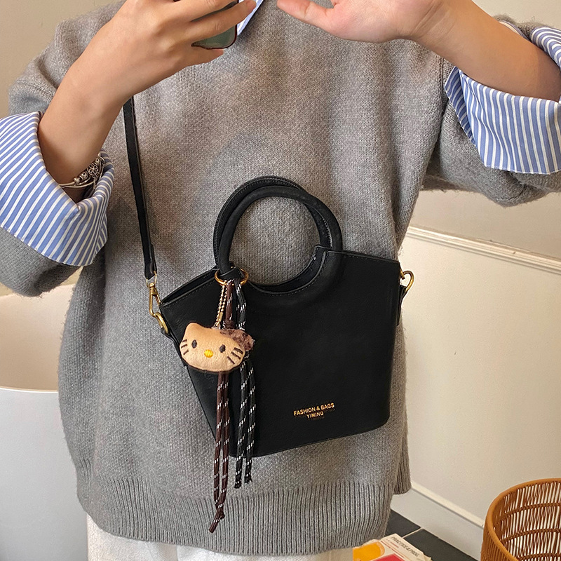 2025 otoño y invierno nuevo bolso retro mochila esmerilado bolso de hombro de moda de mujer bolso de cubo de viaje