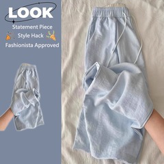 大きいサイズの乳芙のカジュアルなズボンの女性の夏の薄いタイプの高い腰の垂れ下がった感じはやせています。