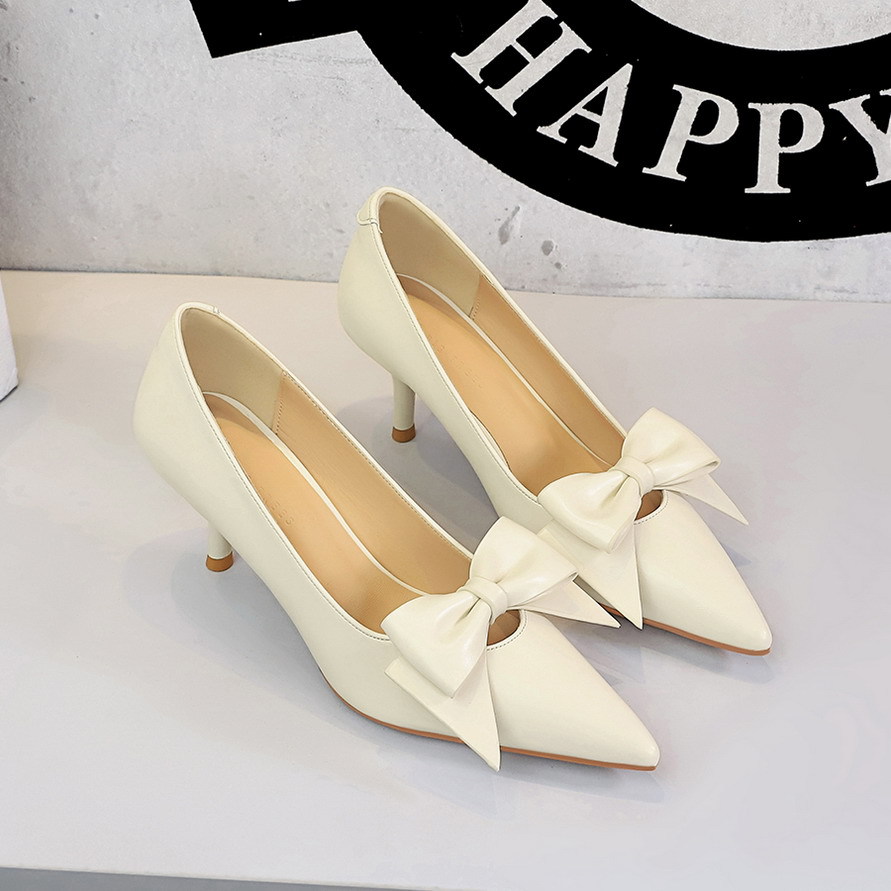 9998-2 Korean style hollow bow bow pointed shallow mouth, one foot pedal, thin heel, Pana pattern professional high heels