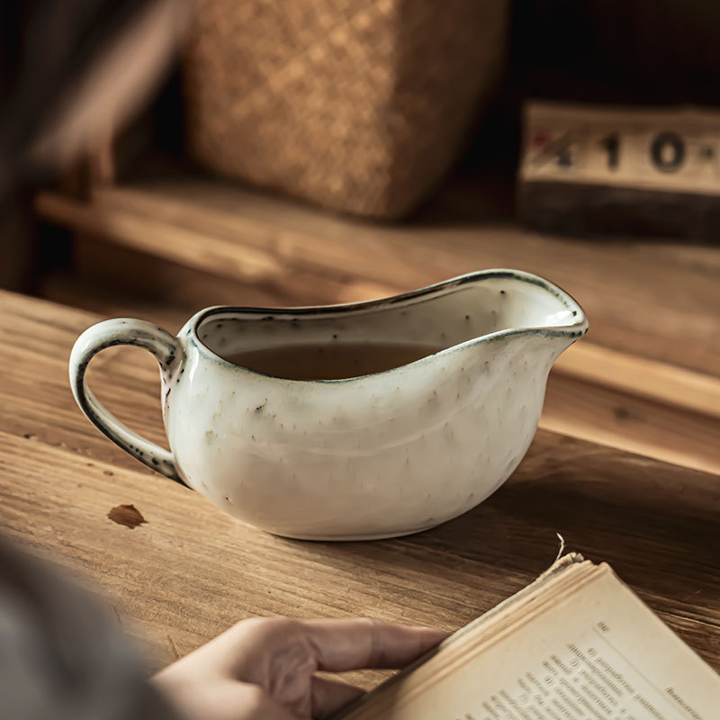 Olla de cerámica de boca afilada creativa Botella de agua de gran capacidad para el hogar retro japonés Botella de agua fría al por mayor Tetera de restaurante Juego de té Bola