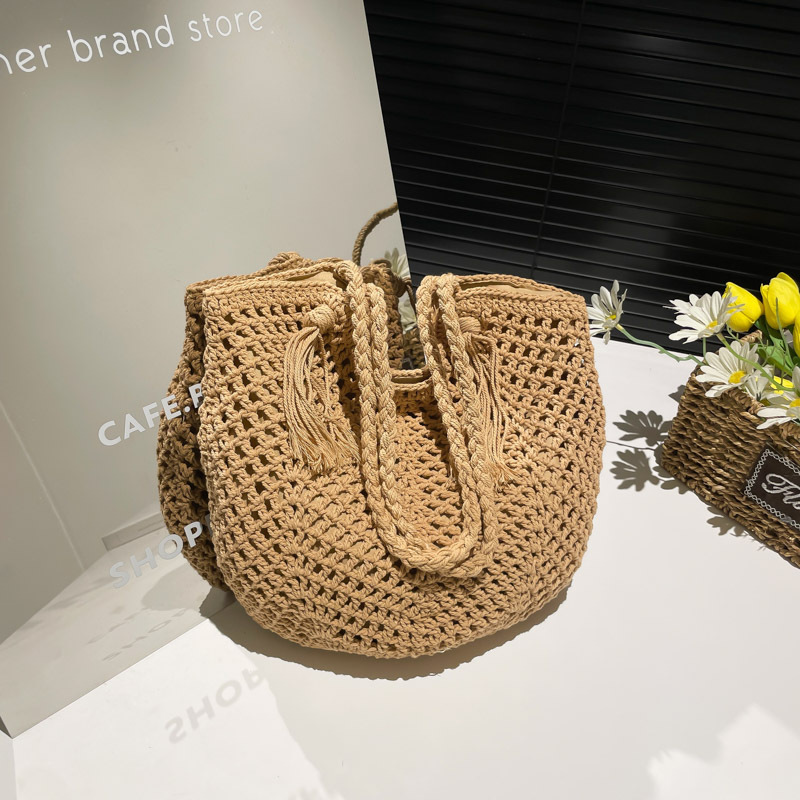 Bolso de vacaciones junto al mar 2025 verano nuevo estilo bolso femenino tejido con flecos bolso de playa de gran capacidad