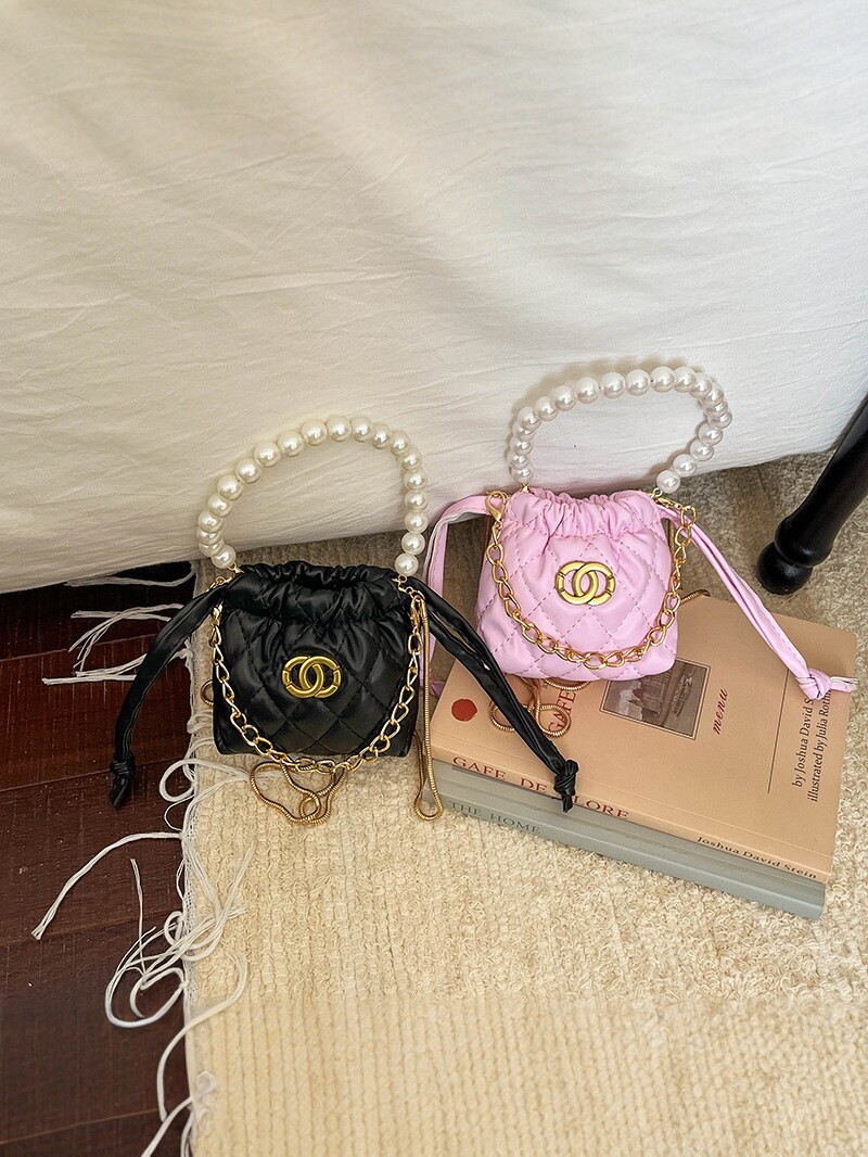 2026 nuevo niño cadena de perlas bolsos de diamante chicas moda mini bolsos de hombro caramelo princesa mochila
