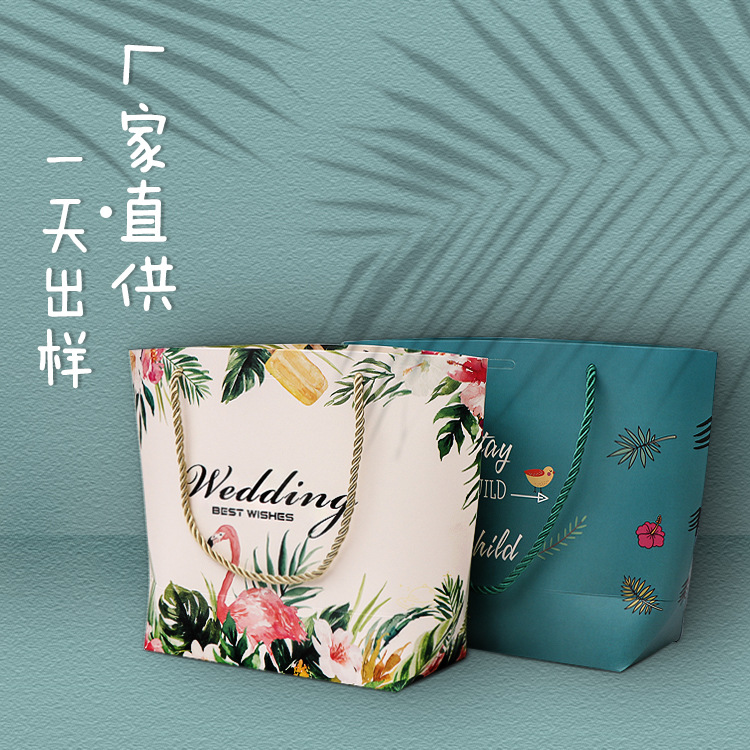 厂家定做白卡纸手提袋定制彩色印刷服装购物袋节日礼品包装元宝袋