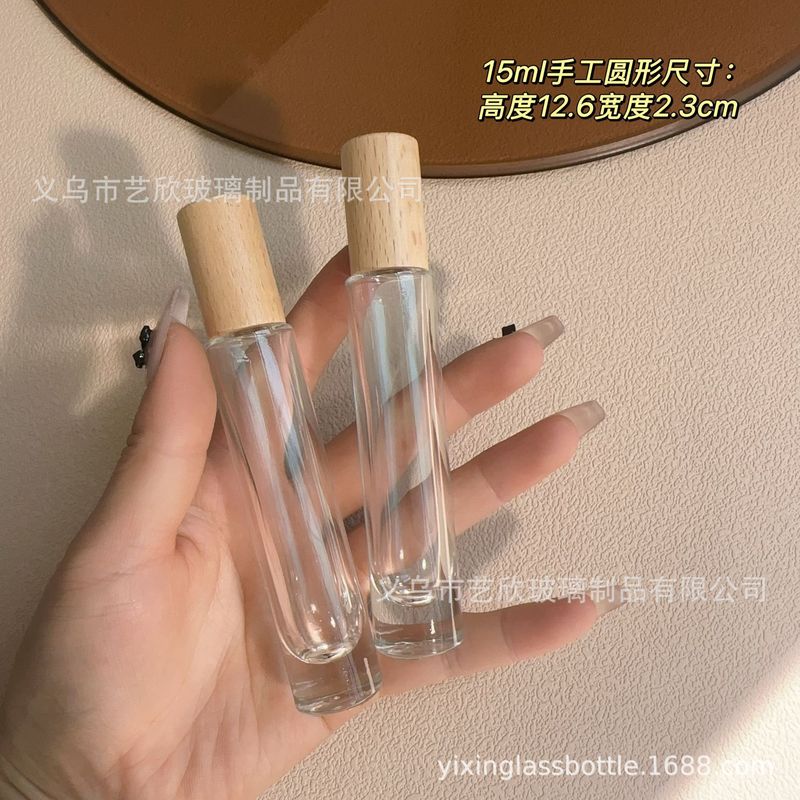 メーカー直販のねじの口の木の蓋のビーズの分注の瓶の10mlのガラスの小さい様子の玉の空の瓶のケヤキの木の精油のボールの瓶|undefined