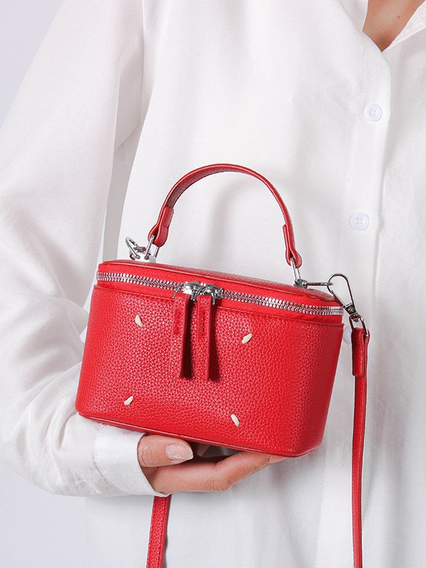 Bolso de caja de estilo occidental de color puro para mujer 2025 nuevo bolso cuadrado pequeño de moda de moda bolso de lonchera de mensajero de un solo hombro de sentido de alta gama