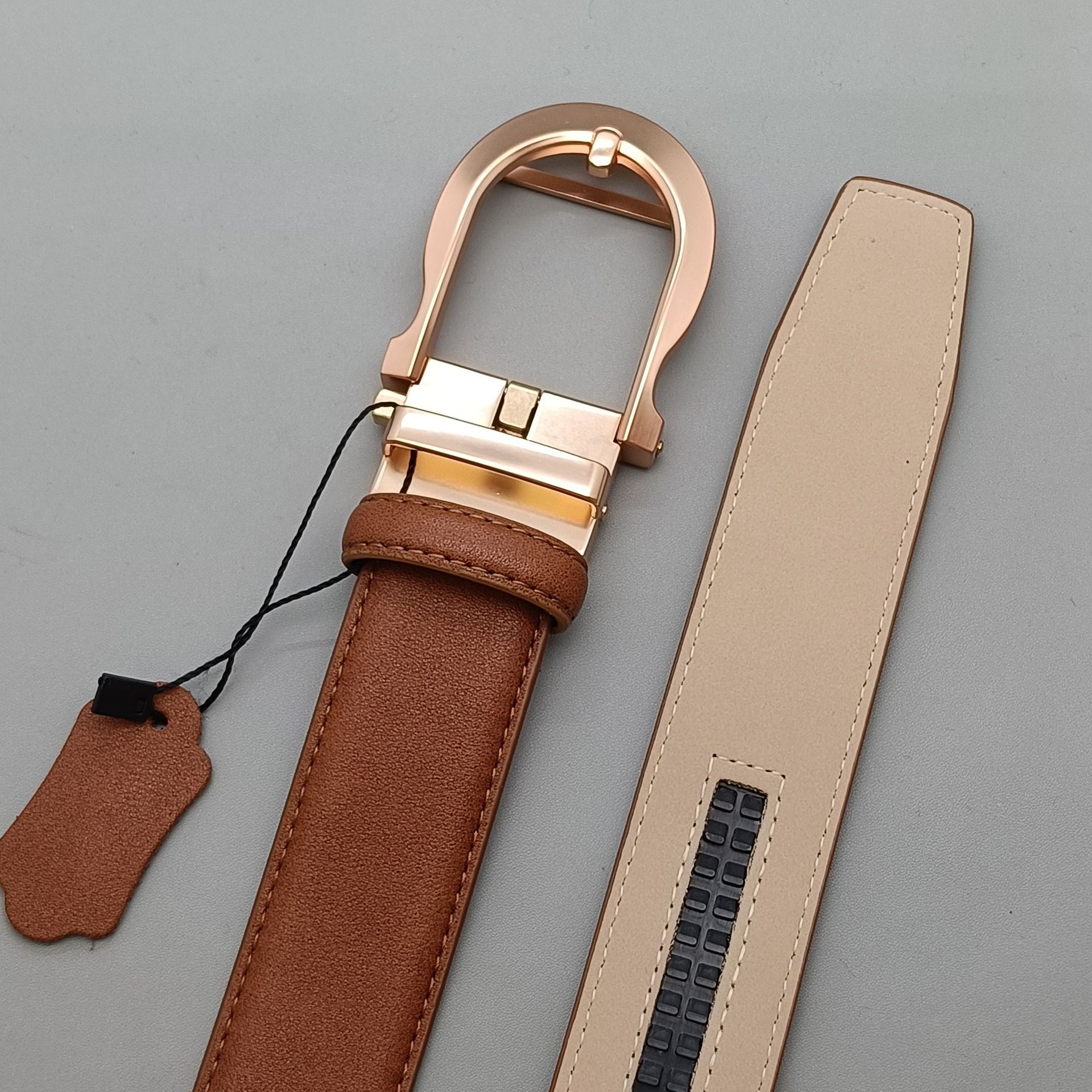 Brown stitching + gold buckle