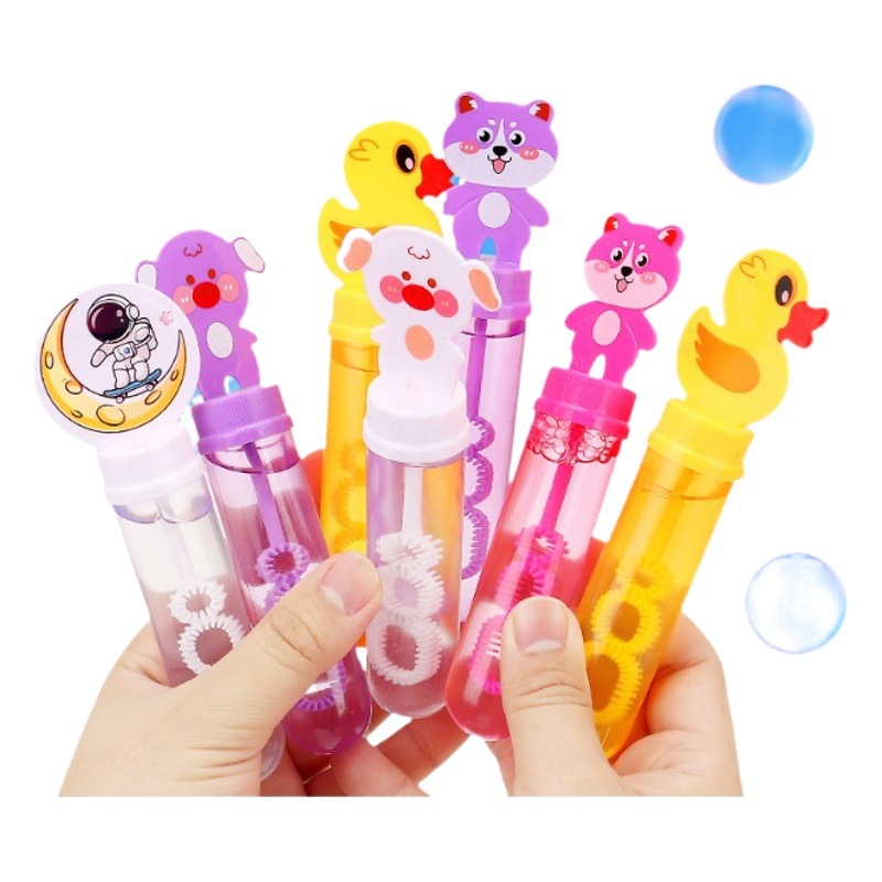 Mini barra de burbujas para niños sosteniendo un pequeño pato amarillo máquina de burbujas dispositivo de burbujas niños y niñas puestos callejeros juguetes al por mayor