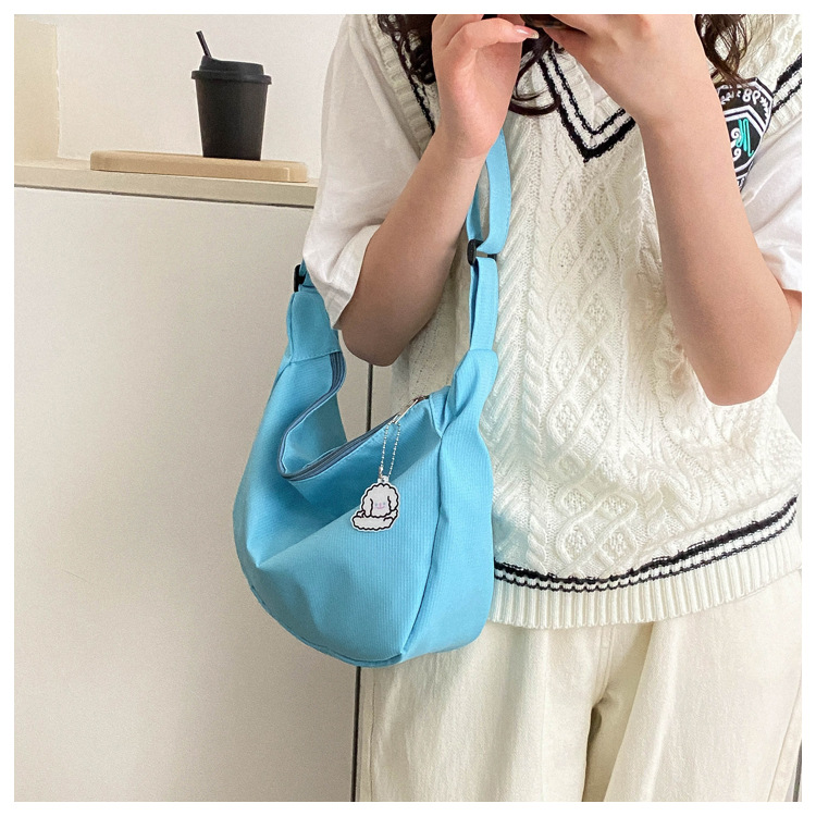 Large capacity canvas shoulder for women in spring summer 2023, new solid color, simple and fashionable casual bag,_voghion.com