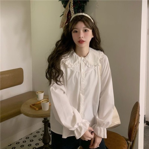 Spring French-style long-sleeved new baby collar blouse for women, student Korean version loose and versatile Japanese design white blouse