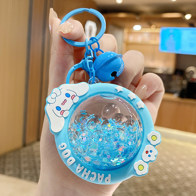 En línea de la celebridad de dibujos animados KT cristal coche llavero mujer libro bolsa colgante pequeña joyería aceite arenas movedizas estrella Delu colgante creativo