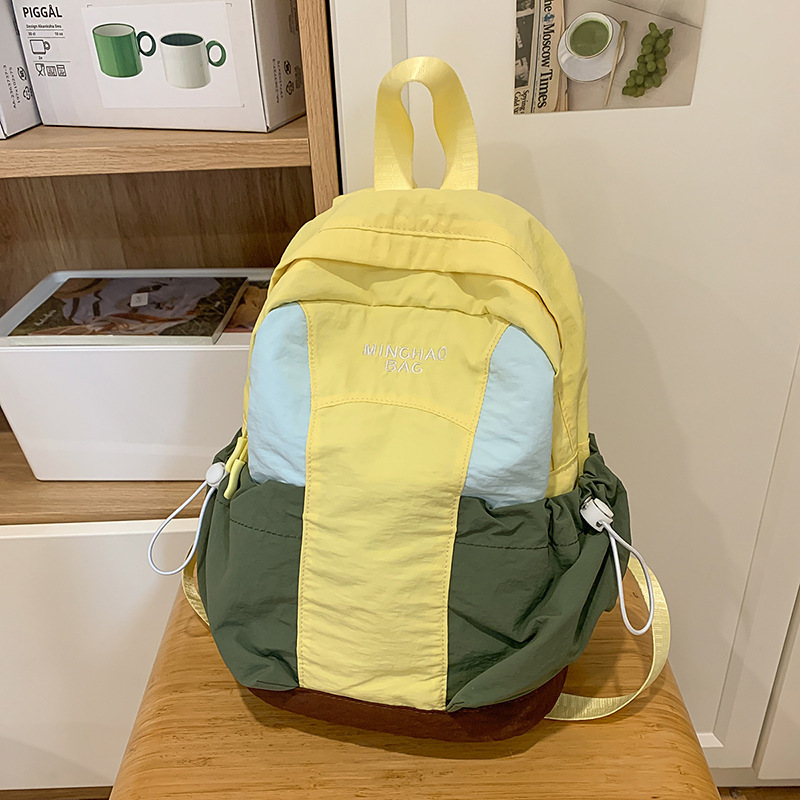 韓国系の新型の衝突色のかわいいリュックサックの女性は簡単に旅行のリュックサックの中学生の小学生のカバンをつなぎ合わせます。|undefined