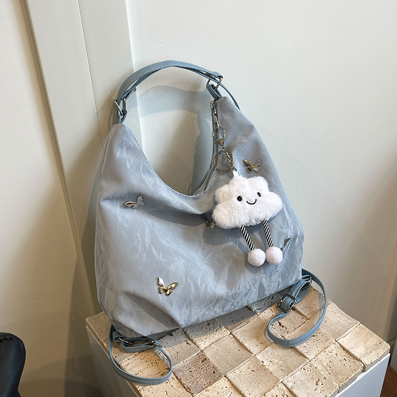 Tote Bag de mujer 2024 nueva mochila casual sensación de alto nivel multifuncional mochila de viaje ligera de hombro