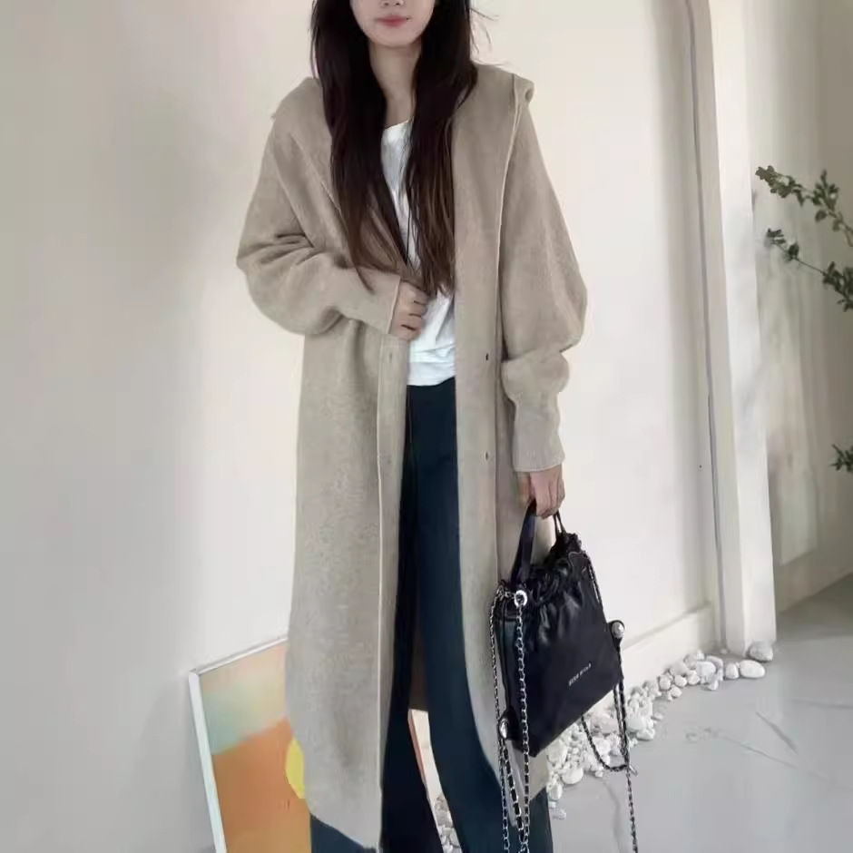 Demi-season long knitted sweater