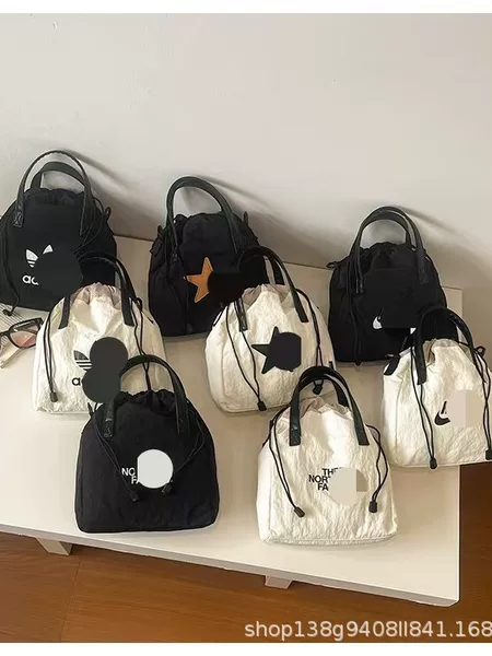 Women's Korean-style new letter-printed nylon shoulder bag, casual versatile portable drawstring large-capacity tote bag