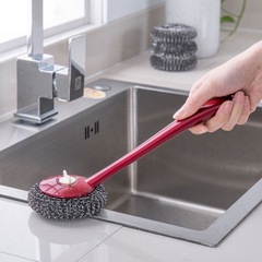 Household long-handled pot brush does not damage the pot, kitchen cleaning and pot washing with a brush to decontaminate dishes, steel wire ball brush pot artifact