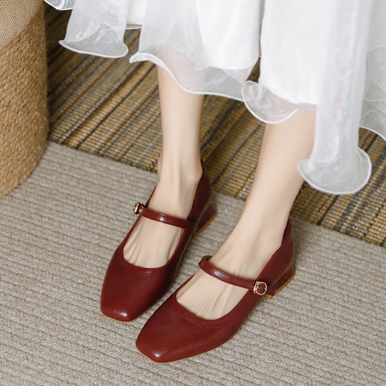 Universal retro minimalistic Mary Jane shoes with a strap made of…