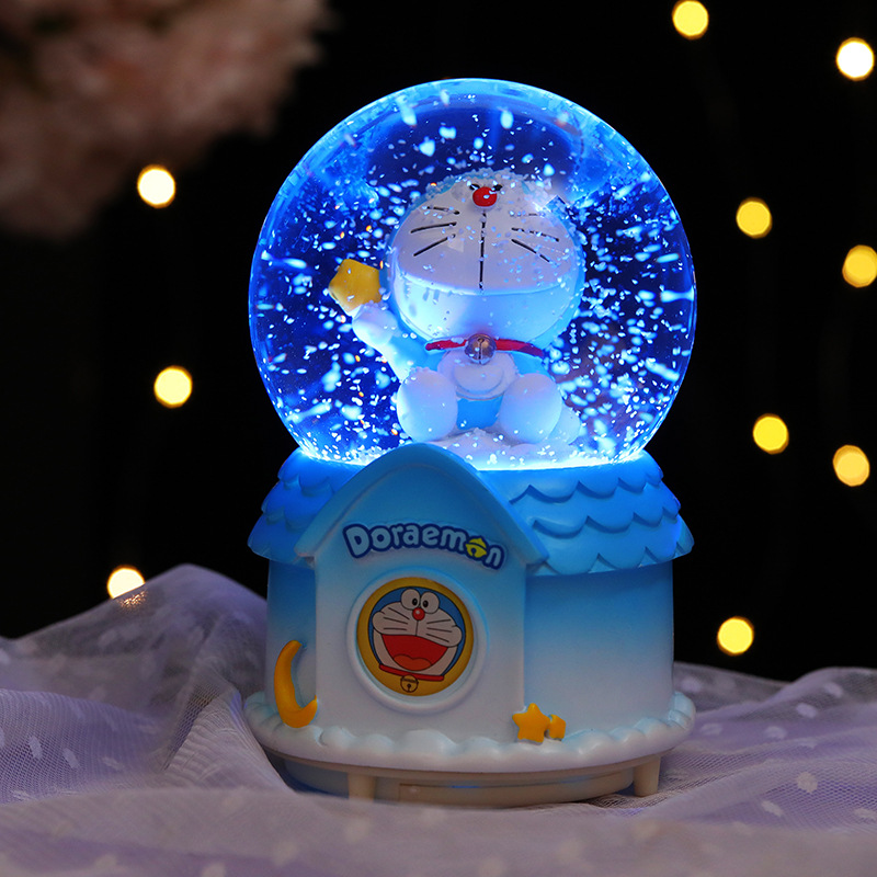 Nueva bola de cristal Doraemon Jingdang gato caja de música automática nieve azul claro grasa regalo de vacaciones