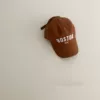 Brown baseball cap