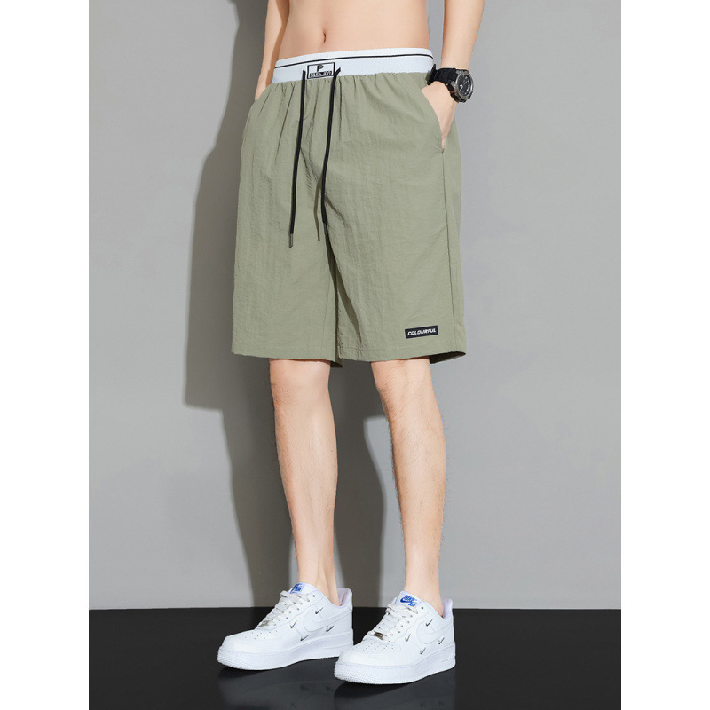 Pantalones cortos delgados de hielo para hombres de verano sueltos y versátiles de cinco puntos deportivos casuales de playa secados rápidos pantalones cortos de baloncesto calzoncillos