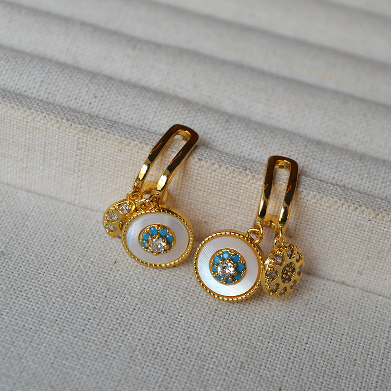 Small design white earrings