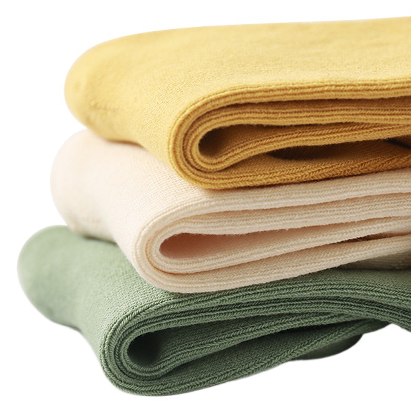 Nuevos calcetines para bebés primavera y otoño boca suelta pies no apretados calcetines para niños transpirable estilo coreano sin hueso color sólido bebé calcetines de media pantorrilla