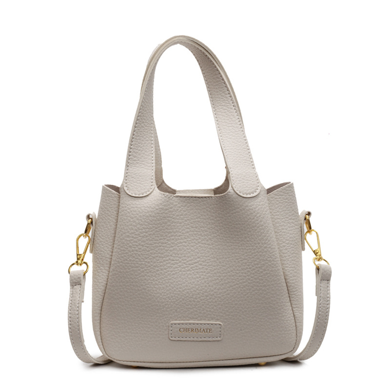 Bolsa de mano ocio transfronteriza versátil para mujeres 2025 nuevo estilo popular retro bolso de cubo de alta calidad simple mochila