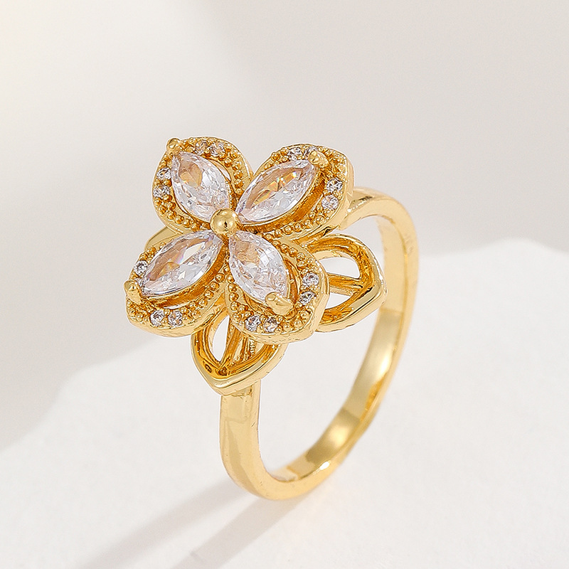 18K oro real color-preservar la suerte de la hierba estilo coreano transfronterizo diamante incrustado rotación de moda abierto anillo ajustable