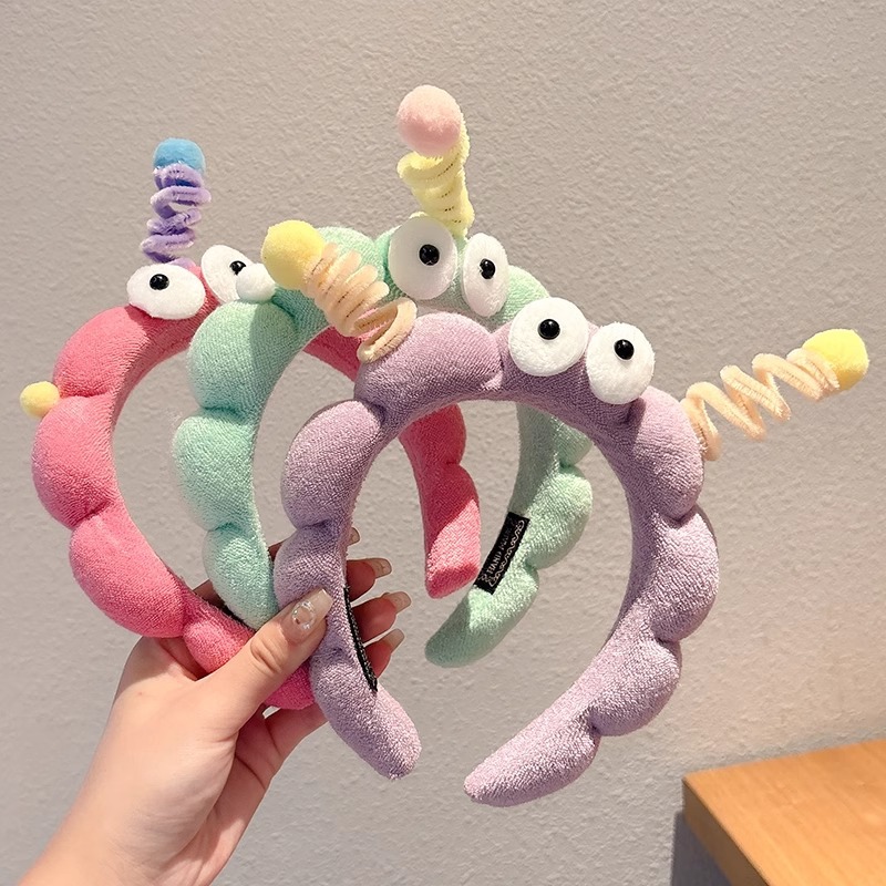 Hermosos ojos grandes torsión varilla esponja banda de cabello para mujeres creativa extraña banda de cabello antideslizante tocado de lavado de cara broca de cabello