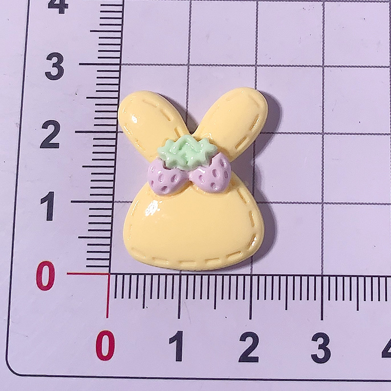 Nuevo color caramelo lindo conejo DIY accesorios de resina crema pegamento para el cabello accesorios para el cabello agujero abrazadera de zapatos agujero material hecho a mano