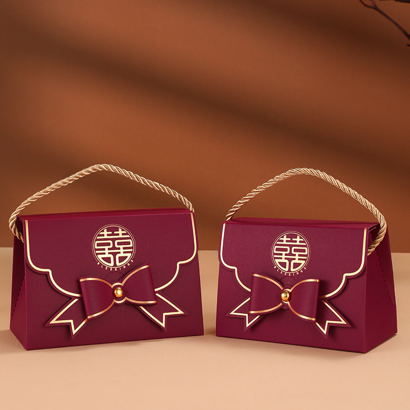 Caja de dulces de boda Boda 2024 Nuevo caramelo portátil de alta gama Empaquetado de dulces de boda Caja de regalo Bolsa vacía