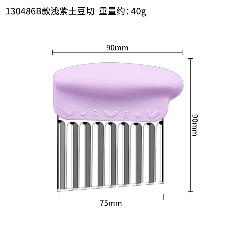ステンレスの波のマッシュポテトは果物と野菜を切って切ります。|undefined