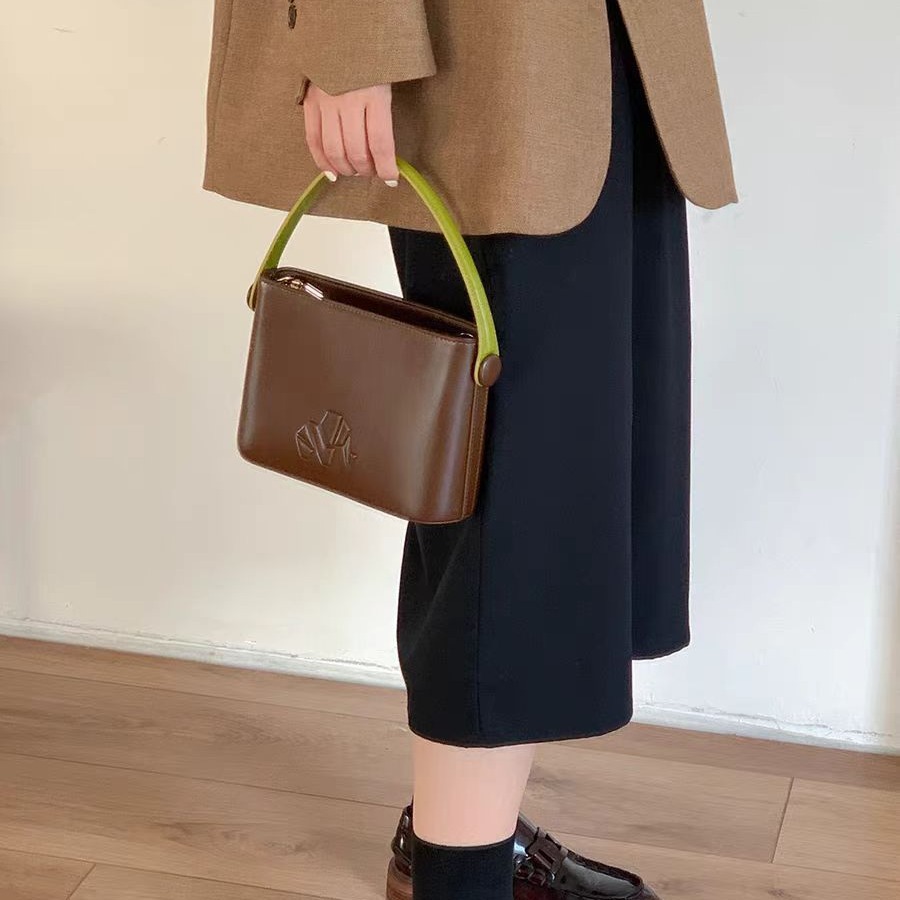 「午後甜點」包包2024小眾復古手提斜挎水桶包女百搭原創