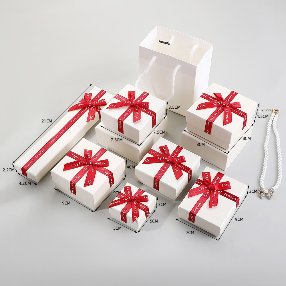 Nuevo alfabeto inglés caja de embalaje de joyería de arco, collar, auriculares, pulsera, caja de regalo de vacaciones