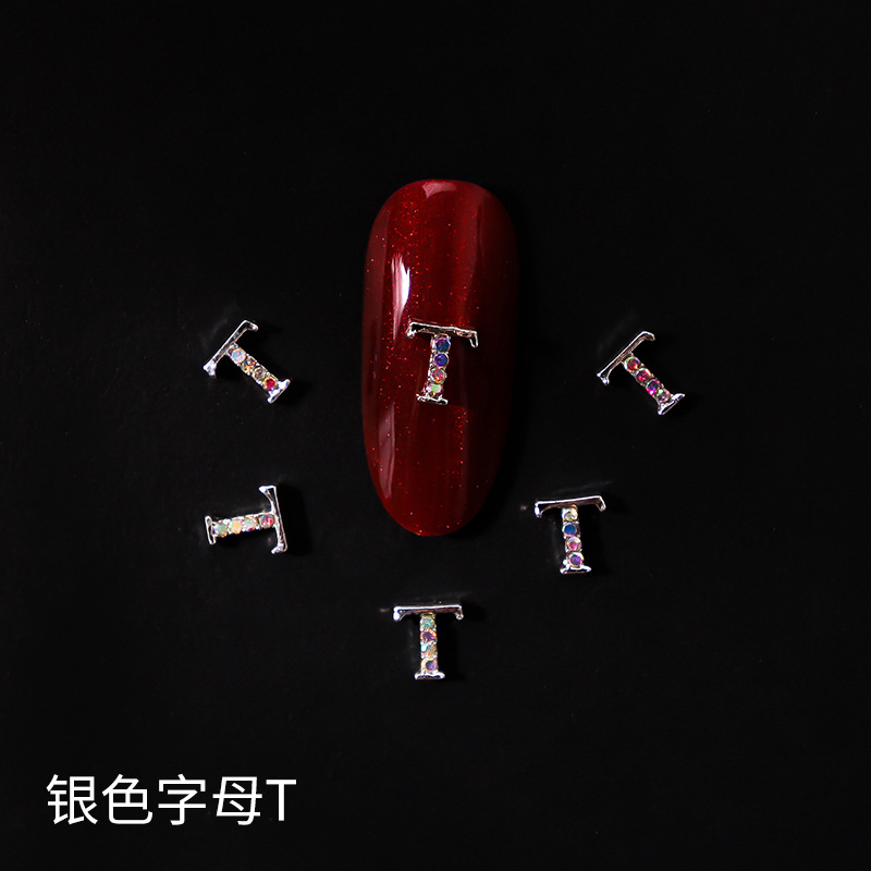 Nueva LZ manicura 26 letras aleación joyería estilo japonés Internet celebridad plata letras manicura joyería clavo Taladro
