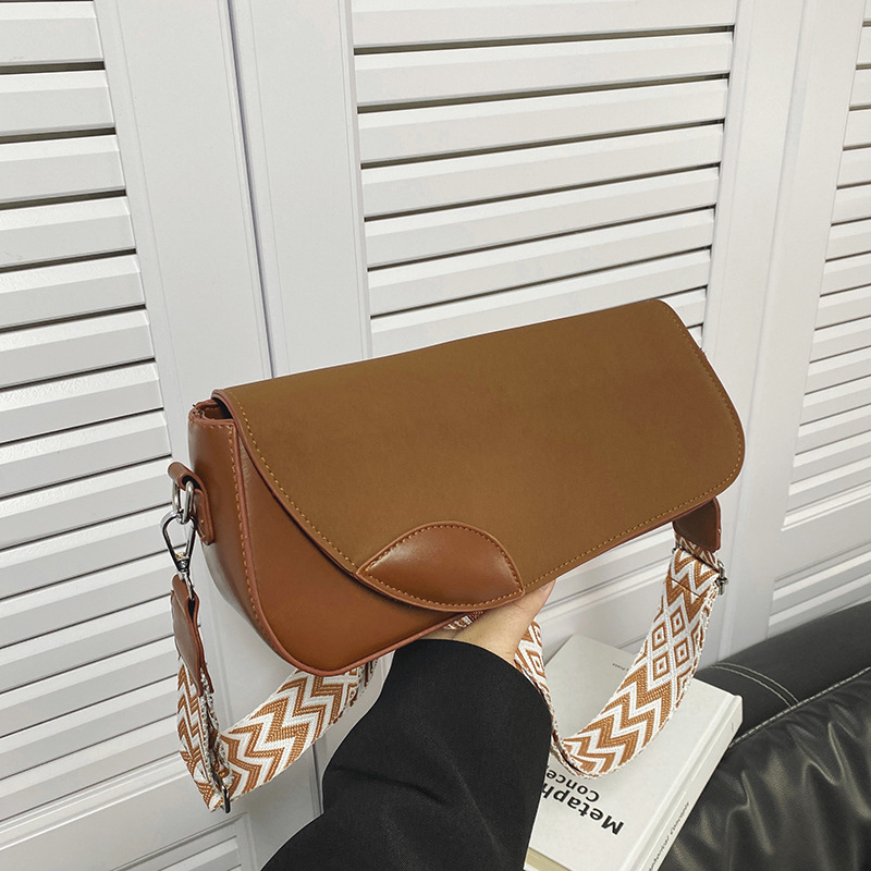 Bolsos pequeños con textura transfronteriza 2025 verano nuevo estilo bolso femenino diseño de nicho bolso de hombro retro bolso de mensajero con correa de hombro ancha