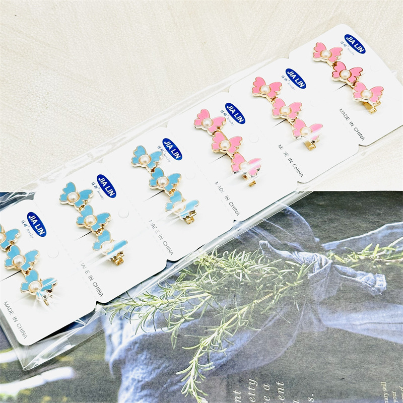 Venta caliente de aleación de oro de diamante incrustado horquilla de pico de pato clip de presión clip de dos yuanes tienda de accesorios para el cabello accesorios para la cabeza puesto de suministro